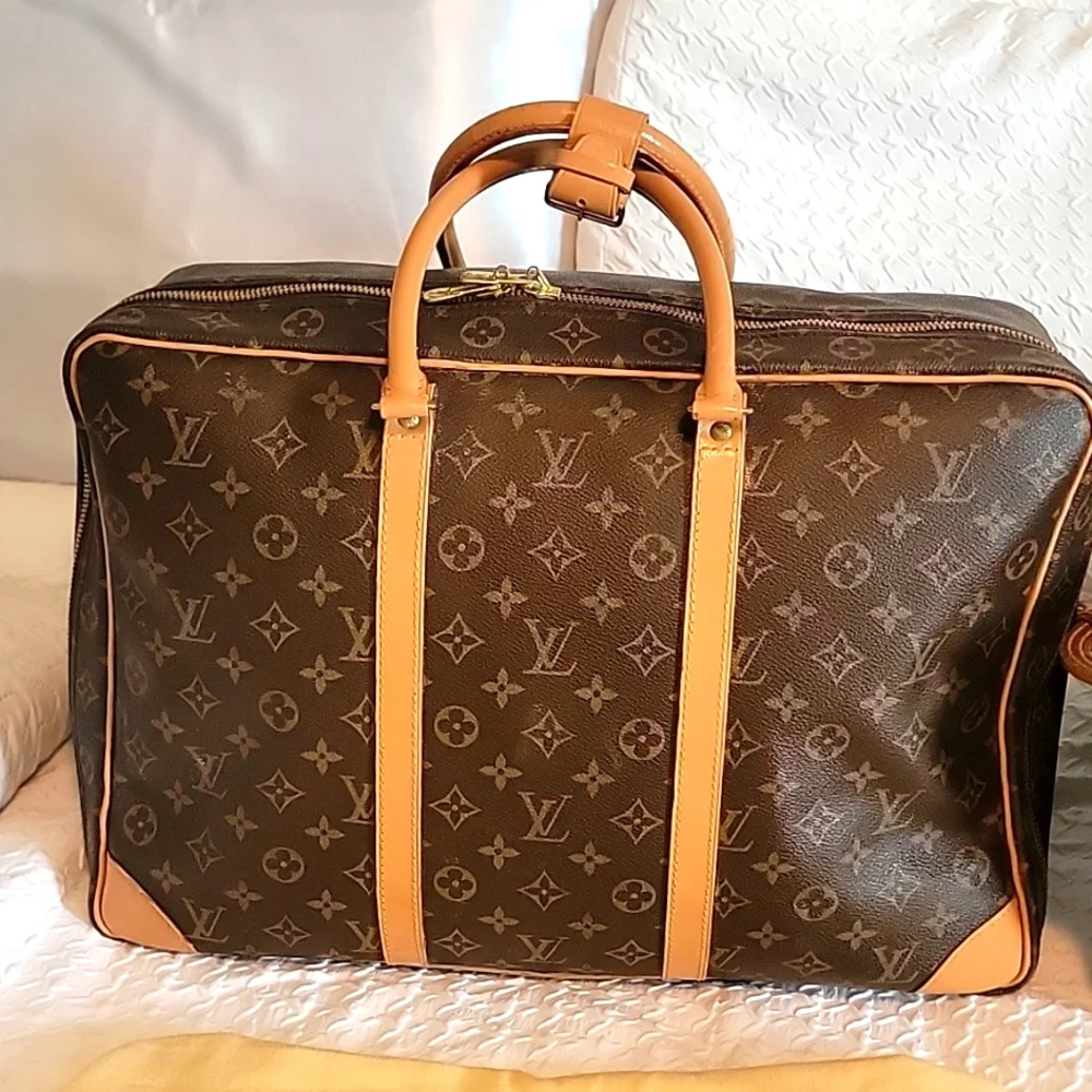 Louis Vuitton AUTHENTIC Sirius travel Bag